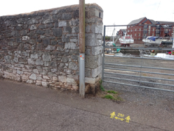 wall between docks & river